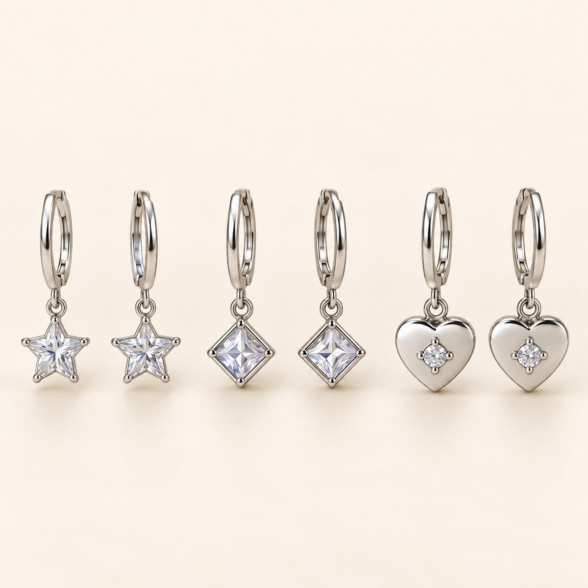 Charm Trio Huggie Set — Studio view