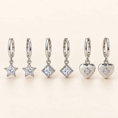 Charm Trio Huggie Set — Studio view