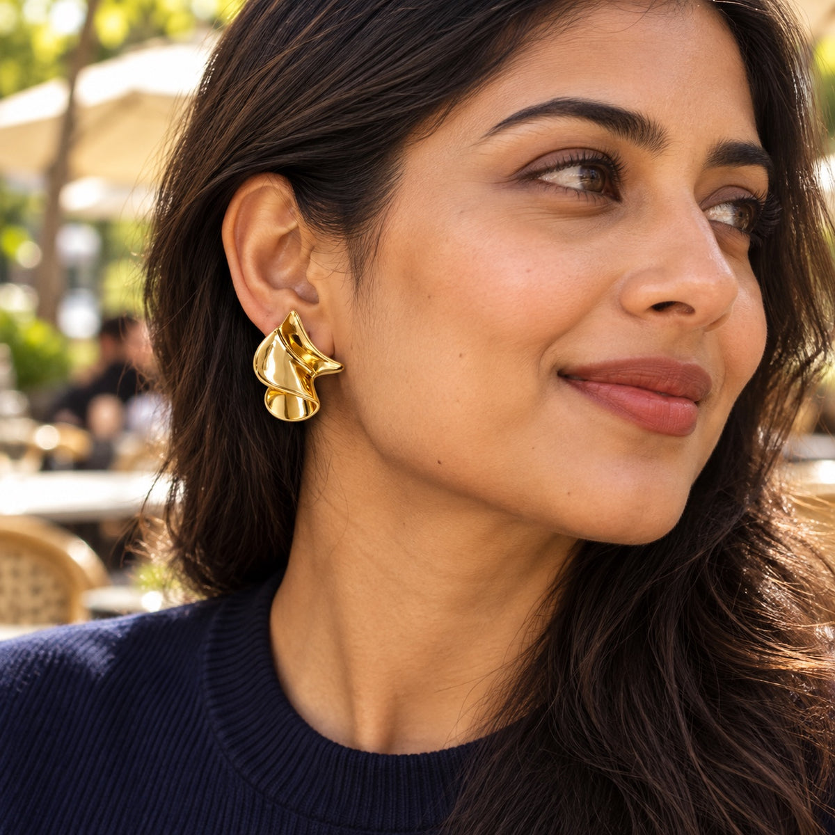 Golden Swirl Earrings — Lifestyle view