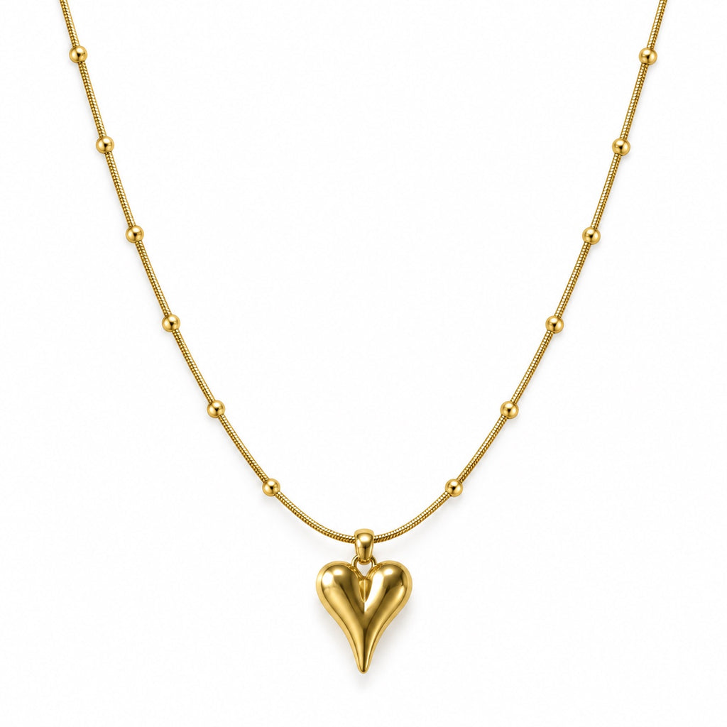 Heart Orbit Necklace — Studio view